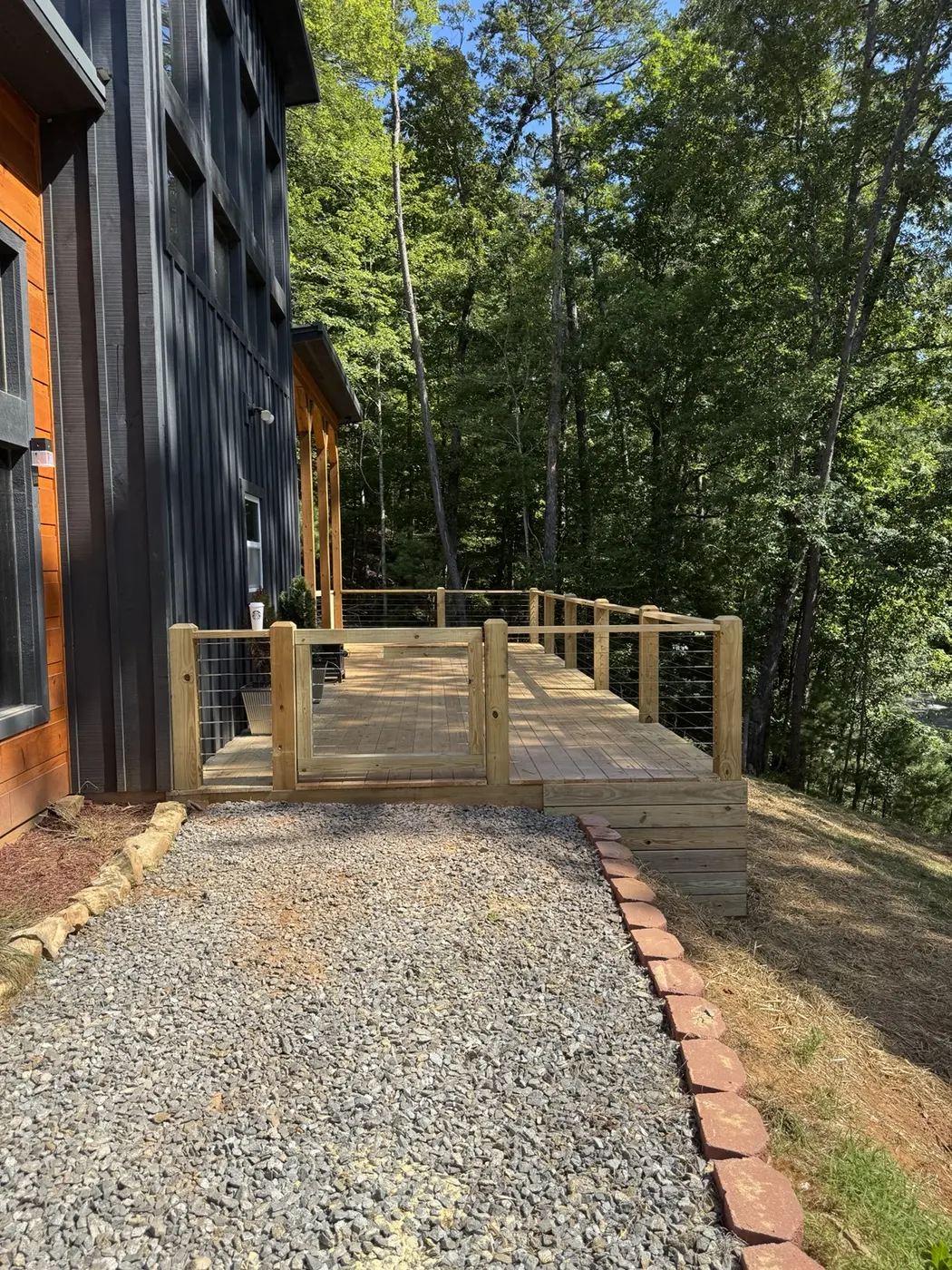 Modern cabin deck entry with cable rail