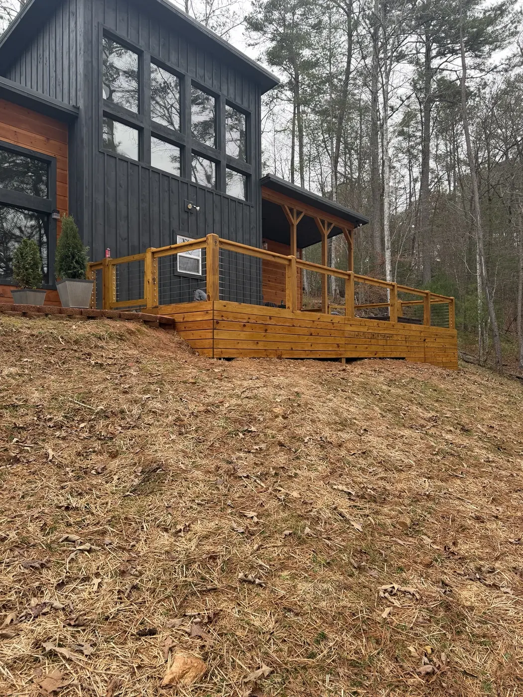 Luxury modern cabin deck with cable railing