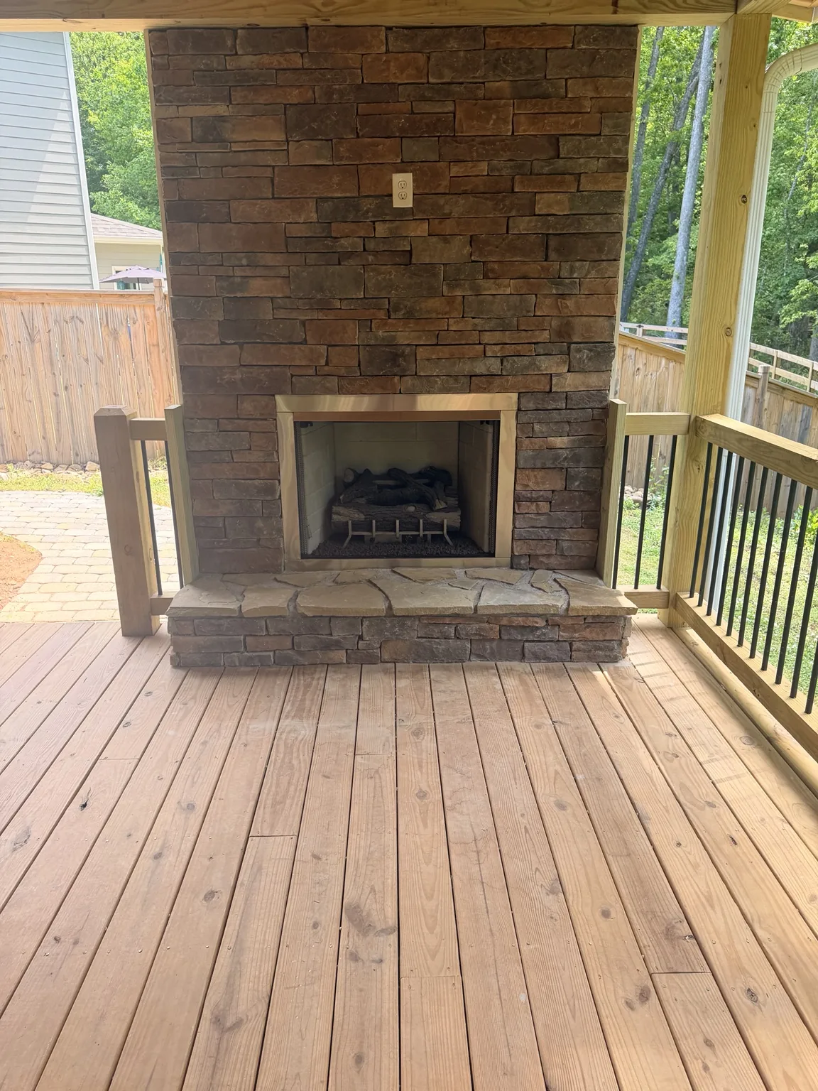 Stone outdoor fireplace